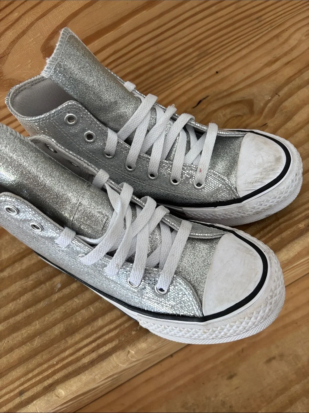 Silver sparkly high top converse